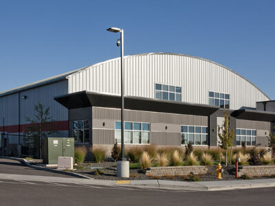 Pre-engineered auction building with radiused roof